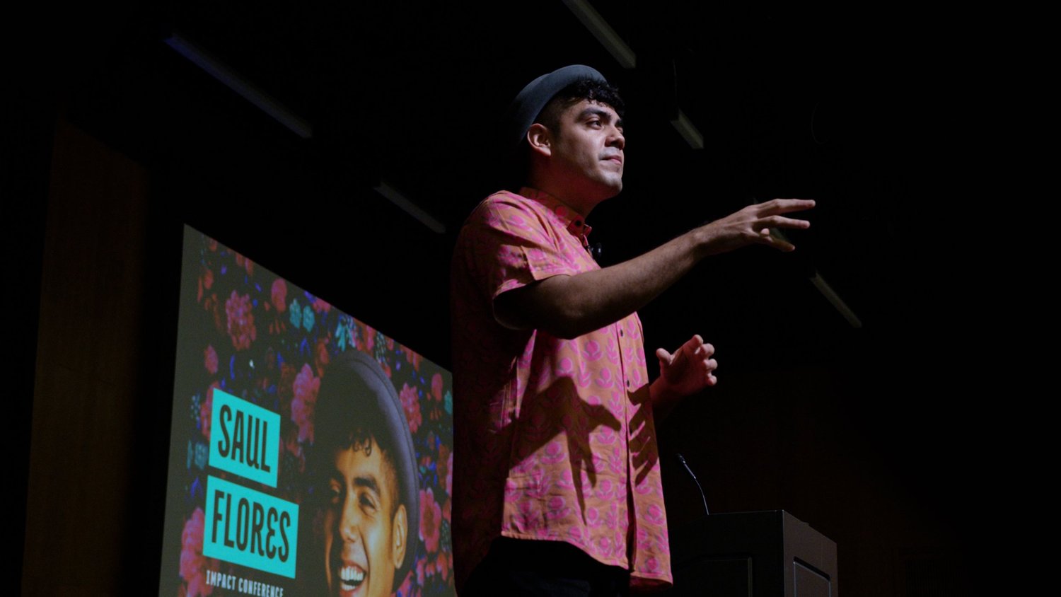 Saul Flores speaking at the Impact Conference